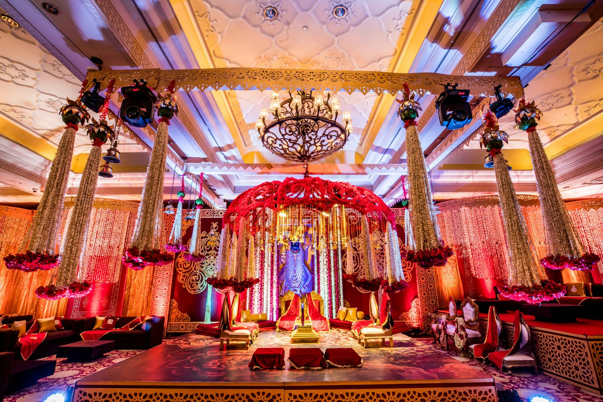 a decorated stage with a chandelier and chandelier